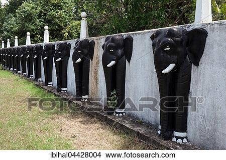 Elephant heads at entrance to Aluvihara Rock Temple, Matale, Central Province, Sri Lanka, Asia View Large Photo Image Picture - Elephant heads at entrance to Aluvihara Rock Temple, Matale, Central Province, Sri Lanka, Asia. Fotosearch