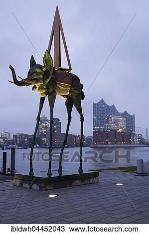 Stock Image - Elephant sculpture, artist Salvador Dali, Elbe River, Elbe Philharmonic Hall, Hamburg, Germany, Europe. Fotosearch