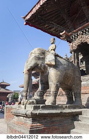 Stock Image - Elephant statues guarding Vishwanath temple in Durbar square, Patan, Nepal, Asia. Fotosearch