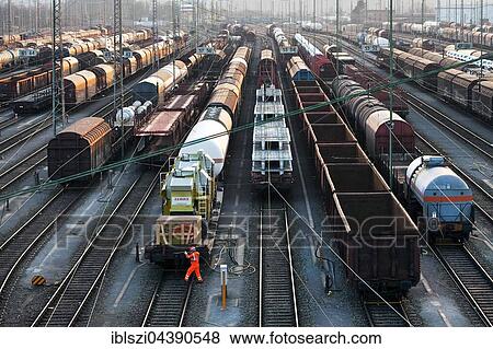 Employees in the freight train depot, Hagen, Ruhr District, North Rhine-Westphalia, Germany District, Europe View Large Photo Image Stock Photo - Employees in the freight train depot, Hagen, Ruhr District, North Rhine-Westphalia, Germany District, Europe. Fotosearch