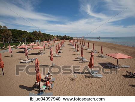 Empty beach with sunshades, holiday resort of Side, Turkish Riviera, Antalya province, Turkey, Asia View Large Photo Image Stock Photo - Empty beach with sunshades, holiday resort of Side, Turkish Riviera, Antalya province, Turkey, Asia. Fotosearch