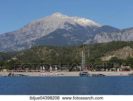 Empty beach, Çamyuva resort with Mt Tahtali, Turkish Riviera, Antalya Province, Turkey, Asia View Large Photo Image Stock Photo - Empty beach, Çamyuva resort with Mt Tahtali, Turkish Riviera, Antalya Province, Turkey, Asia. Fotosearch