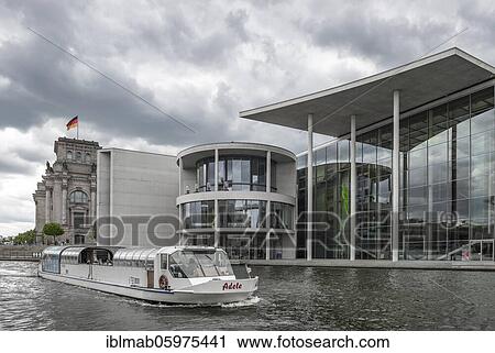 Excursion boat on the Spree, Paul-Löbe-Haus near cloudy sky, government district, Mitte, Berlin, Germany, Europe View Large Photo Image Stock Image - Excursion boat on the Spree, Paul-Löbe-Haus near cloudy sky, government district, Mitte, Berlin, Germany, Europe. Fotosearch