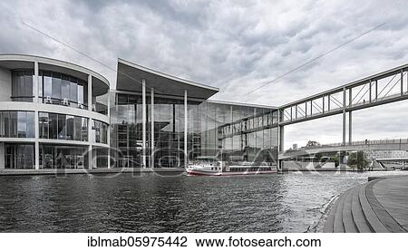 Excursion boat on the Spree, Paul-Löbe-Haus near cloudy sky, government district, Mitte, Berlin, Germany, Europe View Large Photo Image Stock Image - Excursion boat on the Spree, Paul-Löbe-Haus near cloudy sky, government district, Mitte, Berlin, Germany, Europe. Fotosearch