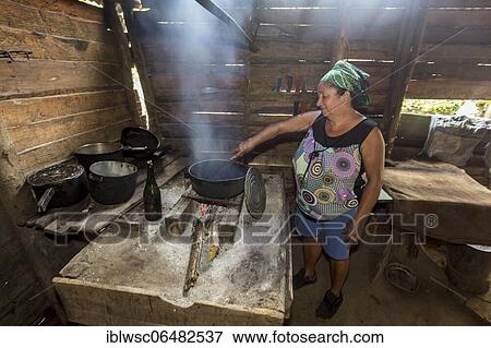 Farmer roasting coffee beans, Santo Domingo, Sierra Maestra, Cuba, Central America View Large Photo Image Stock Photo - Farmer roasting coffee beans, Santo Domingo, Sierra Maestra, Cuba, Central America. Fotosearch