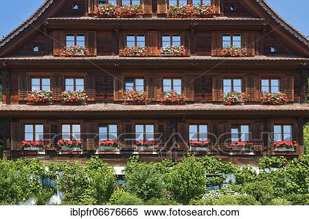 Stock Photography - Farmhouse in the interior of Switzerland. Fotosearch