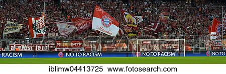Stock Photography - FC Bayern football fans holding flags, Allianz Arena, Munich, Bavaria, Germany, Europe. Fotosearch
