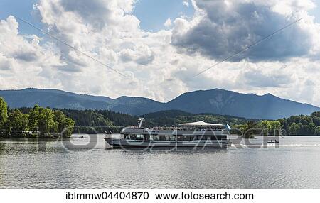 Stock Image - Ferry on Lake Staffelsee, Murnau, Upper Bavaria, Bavaria, Germany, Europe. Fotosearch