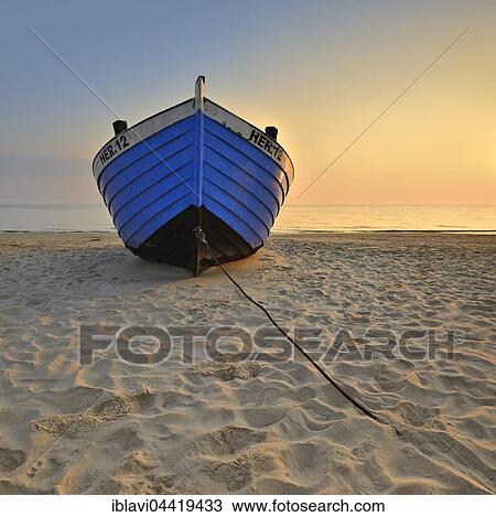 Fishing boat on beach at sunrise, Heringsdorf, Usedom, Mecklenburg-Western Pomerania, Germany, Europe View Large Photo Image Stock Image - Fishing boat on beach at sunrise, Heringsdorf, Usedom, Mecklenburg-Western Pomerania, Germany, Europe. Fotosearch