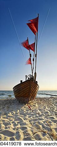 Fishing boat on beach, Kölpinsee, Usedom, Mecklenburg-Western Pomerania, Germany, Europe View Large Photo Image Stock Photo - Fishing boat on beach, Kölpinsee, Usedom, Mecklenburg-Western Pomerania, Germany, Europe. Fotosearch