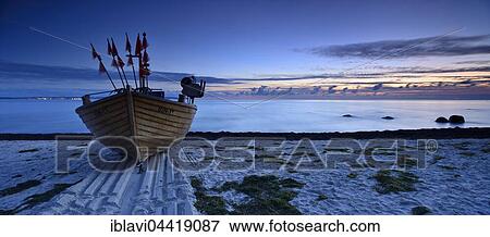 Fishing boat on the beach, twilight, Binz Sea Resort, Rügen, Mecklenburg-Western Pomerania, Germany, Europe View Large Photo Image Stock Photo - Fishing boat on the beach, twilight, Binz Sea Resort, Rügen, Mecklenburg-Western Pomerania, Germany, Europe. Fotosearch