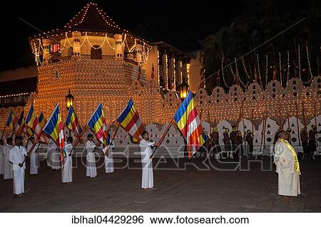 Stock Photograph - Flag bearers, Esala Perahera Buddhist festival, Sri Dalada Maligawa or Temple of the Sacred Tooth Relic, Kandy, Central Province, Sri Lanka, Asia. Fotosearch