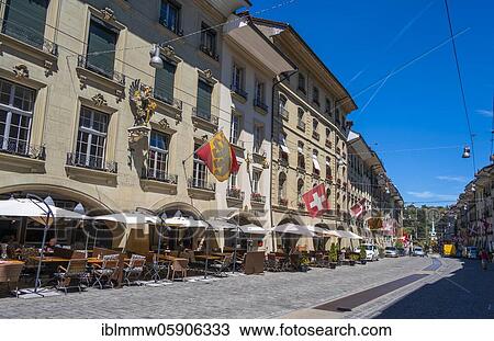 Stock Image - Flags on a row of houses in the old town of Bern, Innere Stadt, Bern, Canton Bern, Switzerland, Europe. Fotosearch