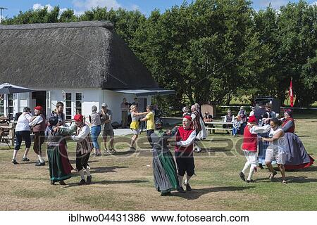 Folk dance, group dancing with tourists, Sunday village tradition, Toftum, Rømø, Southern Denmark, Denmark, Europe View Large Photo Image Stock Photograph - Folk dance, group dancing with tourists, Sunday village tradition, Toftum, Rømø, Southern Denmark, Denmark, Europe. Fotosearch