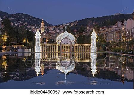 Fountain at Promenade du Paillon, blue hour, water reflections, Nice, Provence-Alpes-Côte d'Azur, France, Europe View Large Photo Image Stock Photo - Fountain at Promenade du Paillon, blue hour, water reflections, Nice, Provence-Alpes-Côte d'Azur, France, Europe. Fotosearch