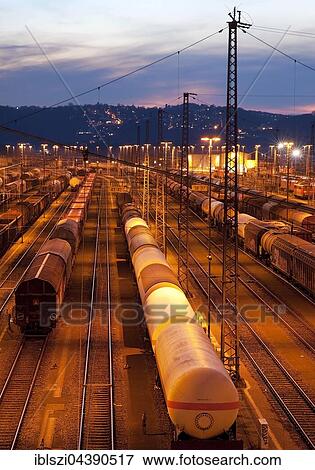 Freight train depot at twilight, Hagen, Ruhr district, North Rhine-Westphalia, Germany, Europe View Large Photo Image Stock Photo - Freight train depot at twilight, Hagen, Ruhr district, North Rhine-Westphalia, Germany, Europe. Fotosearch