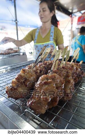Fried skewers, satay skewer at a market stall, Krabi Town, Krabi Province, Thailand, Asia View Large Photo Image Stock Photo - Fried skewers, satay skewer at a market stall, Krabi Town, Krabi Province, Thailand, Asia. Fotosearch