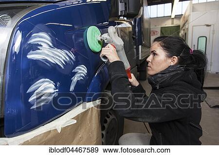 Garage, coachbuilder polishing a vehicle, Düsseldorf, North Rhine-Westphalia, Germany, Europe View Large Photo Image Stock Photo - Garage, coachbuilder polishing a vehicle, Düsseldorf, North Rhine-Westphalia, Germany, Europe. Fotosearch