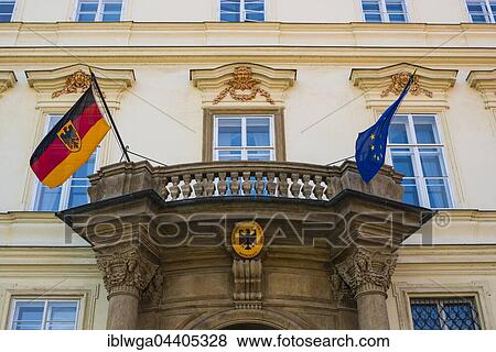 Stock Photo - German Embassy with waving flags, Portal, Lobkowicz Palace, Prague, Bohemia, Czech Republic, Europe. Fotosearch