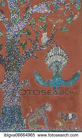 Glass mosaic shows the tree of life, as well as peacock, panther and other animals, Sim prayer hall, Wat Xieng Thong, Luang Prabang, Laos, Asia View Large Photo Image Stock Photography - Glass mosaic shows the tree of life, as well as peacock, panther and other animals, Sim prayer hall, Wat Xieng Thong, Luang Prabang, Laos, Asia. Fotosearch