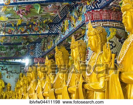 Golden standing Buddha statues, Linh Phuoc Pagoda, Đà Lạt, Lâm Đồng Province, Vietnam, Asia View Large Photo Image Stock Photo - Golden standing Buddha statues, Linh Phuoc Pagoda, Đà Lạt, Lâm Đồng Province, Vietnam, Asia. Fotosearch