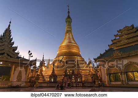 Golden Stupa at dusk, Buddhist pagoda Shwemokhtaw, Pathein, Myanmar, Asia View Large Photo Image Stock Photo - Golden Stupa at dusk, Buddhist pagoda Shwemokhtaw, Pathein, Myanmar, Asia. Fotosearch