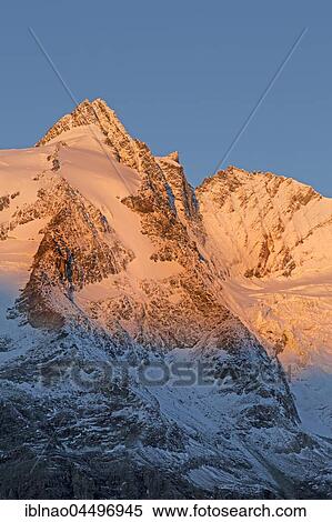 Grossglockner summit at sunrise, High Tauern National Park, Carinthia, Austria, Europe View Large Photo Image Stock Photography - Grossglockner summit at sunrise, High Tauern National Park, Carinthia, Austria, Europe. Fotosearch