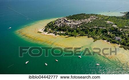 Grottoes of Catullus, archaeological park, peninsula in turquoise waters, Sirmione, Lake Garda, Lombardy, Italy, Europe View Large Photo Image Stock Photo - Grottoes of Catullus, archaeological park, peninsula in turquoise waters, Sirmione, Lake Garda, Lombardy, Italy, Europe. Fotosearch