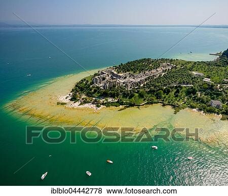 Grottoes of Catullus, archaeological park, peninsula in turquoise waters, Sirmione, Lake Garda, Lombardy, Italy, Europe View Large Photo Image Stock Photo - Grottoes of Catullus, archaeological park, peninsula in turquoise waters, Sirmione, Lake Garda, Lombardy, Italy, Europe. Fotosearch