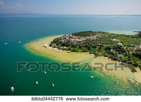 Grottoes of Catullus, archaeological park, peninsula in turquoise waters, Sirmione, Lake Garda, Lombardy, Italy, Europe View Large Photo Image Stock Photograph - Grottoes of Catullus, archaeological park, peninsula in turquoise waters, Sirmione, Lake Garda, Lombardy, Italy, Europe. Fotosearch
