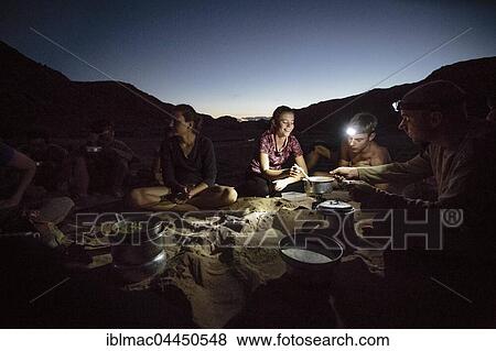 Group of campers cooking on riverbank, evening light, Fish River, Fish River Canyon, Namibia, Africa View Large Photo Image Stock Photo - Group of campers cooking on riverbank, evening light, Fish River, Fish River Canyon, Namibia, Africa. Fotosearch