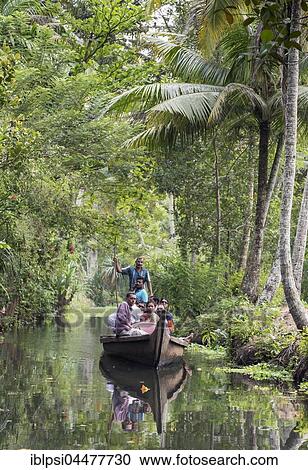 Group of Indian Tourists on a boat, Backwaters, Kerala, India, Asia View Large Photo Image Stock Image - Group of Indian Tourists on a boat, Backwaters, Kerala, India, Asia. Fotosearch