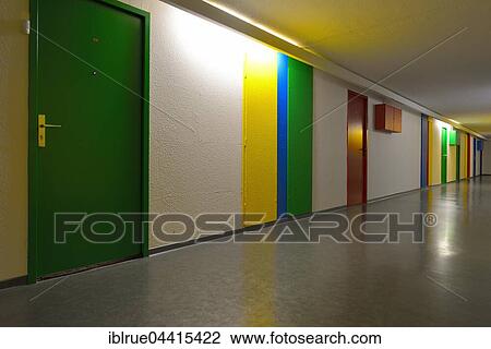 Hallway with colorful doors, Unité d'habitation de Briey, designed by Le Corbusier, modernist residential housing, UNESCO World Heritage Site, Briey, Meurthe-et-Moselle, Lorraine, France, Europe View Large Photo Image Stock Image - Hallway with colorful doors, Unité d'habitation de Briey, designed by Le Corbusier, modernist residential housing, UNESCO World Heritage Site, Briey, Meurthe-et-Moselle, Lorraine, France, Europe. Fotosearch
