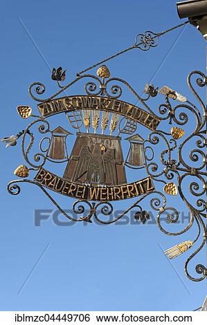 Hanging sign, Gasthaus Zum Schwarzen Adler, restaurant, blue sky, Kirchehrenbach, Upper Franconia, Bavaria, Germany, Europe View Large Photo Image Stock Photograph - Hanging sign, Gasthaus Zum Schwarzen Adler, restaurant, blue sky, Kirchehrenbach, Upper Franconia, Bavaria, Germany, Europe. Fotosearch