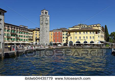 Harbour, Torre Apponale clock tower, Riva del Garda, Lake Garda, Trentino Province, Italy, Europe View Large Photo Image Stock Photo - Harbour, Torre Apponale clock tower, Riva del Garda, Lake Garda, Trentino Province, Italy, Europe. Fotosearch