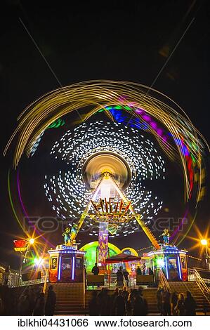 High Energy, carnival ride in motion, night scene, Oktoberfest, Munich, Bavaria, Germany, Europe View Large Photo Image Stock Photograph - High Energy, carnival ride in motion, night scene, Oktoberfest, Munich, Bavaria, Germany, Europe. Fotosearch