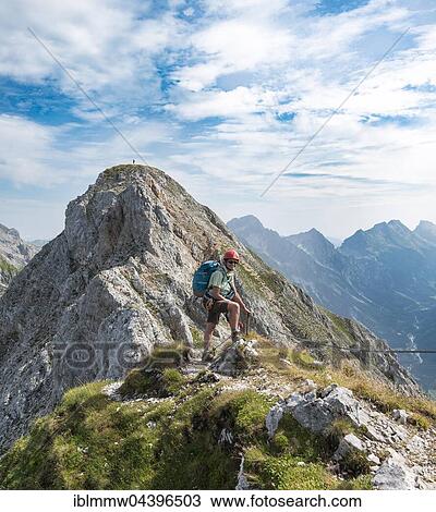 Hiker on via ferrata, hiking trail, Mittenwalder Höhenweg, Karwendel, Mittenwald, Germany, Europe View Large Photo Image Stock Image - Hiker on via ferrata, hiking trail, Mittenwalder Höhenweg, Karwendel, Mittenwald, Germany, Europe. Fotosearch