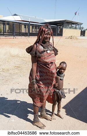 Himba woman with child, Okongwati, Namibia, Africa View Large Photo Image Stock Photograph - Himba woman with child, Okongwati, Namibia, Africa. Fotosearch