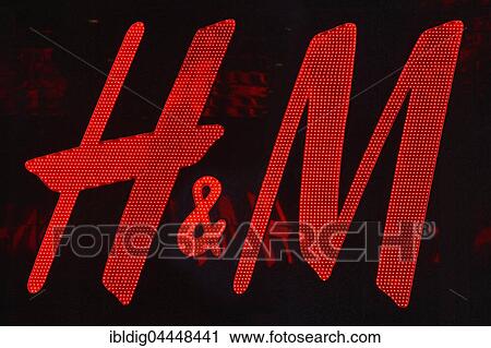 H&M, illuminated shop sign View Large Photo Image Stock Image - H&M, illuminated shop sign. Fotosearch