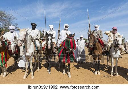 Stock Image - Horse rider at a Tribal festival, Sahel, Chad, Africa. Fotosearch
