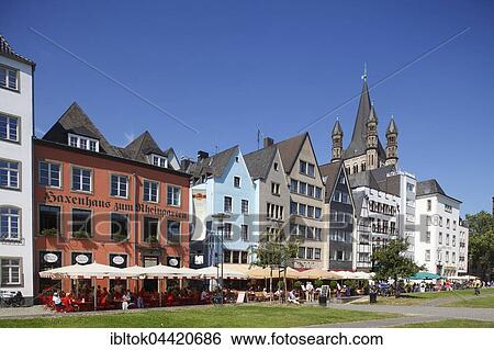 Houses and restaurants along Rhine river bank, Great St. Martin Church behind, Cologne, North Rhine-Westphalia, Germany, Europe View Large Photo Image Stock Photograph - Houses and restaurants along Rhine river bank, Great St. Martin Church behind, Cologne, North Rhine-Westphalia, Germany, Europe. Fotosearch
