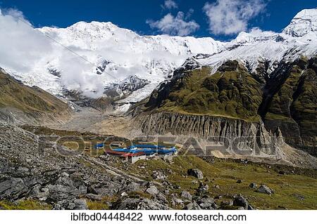 Houses of Annapurna Base Camp, glacier and the snow covered Annapurna 1 North Face, Chomrong, Kaski District, Nepal, Asia View Large Photo Image Stock Image - Houses of Annapurna Base Camp, glacier and the snow covered Annapurna 1 North Face, Chomrong, Kaski District, Nepal, Asia. Fotosearch