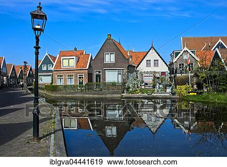 Houses on small channel with water reflection, Volendam, North Holland Province, Holland, The Netherlands, Europe View Large Photo Image Stock Photo - Houses on small channel with water reflection, Volendam, North Holland Province, Holland, The Netherlands, Europe. Fotosearch