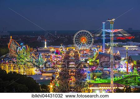Illuminated fairground at night, Oktoberfest, Theresienwiese, Munich, Bavaria, Germany, Europe View Large Photo Image Stock Image - Illuminated fairground at night, Oktoberfest, Theresienwiese, Munich, Bavaria, Germany, Europe. Fotosearch