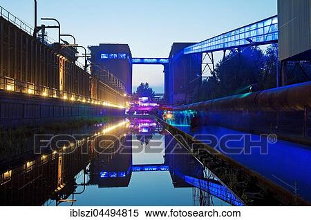 Illuminated Hansa coking plant, extra shift, Twilight, Dortmund, Ruhr district, North Rhine-Westphalia, Germany, Europe View Large Photo Image Stock Photography - Illuminated Hansa coking plant, extra shift, Twilight, Dortmund, Ruhr district, North Rhine-Westphalia, Germany, Europe. Fotosearch