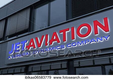 Illuminated logo of the company for services in the field of Airtaxi, Jet Aviation, Düsseldorf Airport, North Rhine-Westphalia, Germany, Europe View Large Photo Image Stock Photo - Illuminated logo of the company for services in the field of Airtaxi, Jet Aviation, Düsseldorf Airport, North Rhine-Westphalia, Germany, Europe. Fotosearch