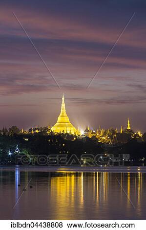 Illuminated Shwedagon Pagoda at sunset, The Great Dagon Pagoda, seen from Kandawgyi Lake, Yangon, Myanmar, Asia View Large Photo Image Stock Photo - Illuminated Shwedagon Pagoda at sunset, The Great Dagon Pagoda, seen from Kandawgyi Lake, Yangon, Myanmar, Asia. Fotosearch