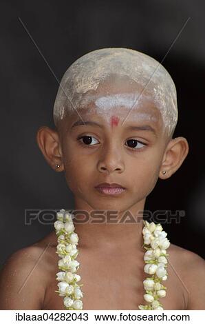 Indian child with flower garland, portrait, Kuala Lumpur, Malaysia, Asia View Large Photo Image Stock Image - Indian child with flower garland, portrait, Kuala Lumpur, Malaysia, Asia. Fotosearch