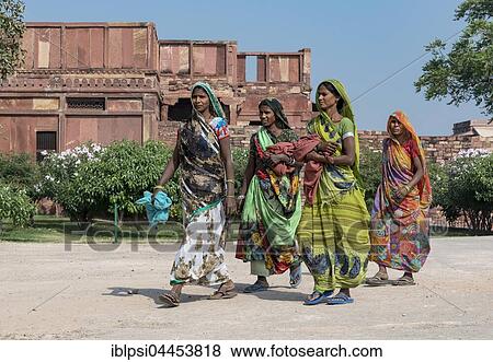 Indian women in traditional colorful sari dresses, Fatehpur Sikri, India, Asia View Large Photo Image Stock Photo - Indian women in traditional colorful sari dresses, Fatehpur Sikri, India, Asia. Fotosearch