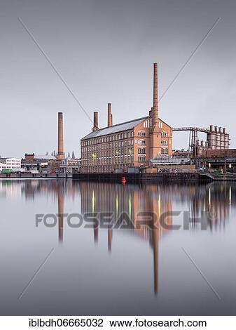 Industrial architecture at the river Spree, former cable factory Oberschöneweide (KWO), water reflection, Oberschöneweide, Berlin, Germany, Europe View Large Photo Image Stock Image - Industrial architecture at the river Spree, former cable factory Oberschöneweide (KWO), water reflection, Oberschöneweide, Berlin, Germany, Europe. Fotosearch